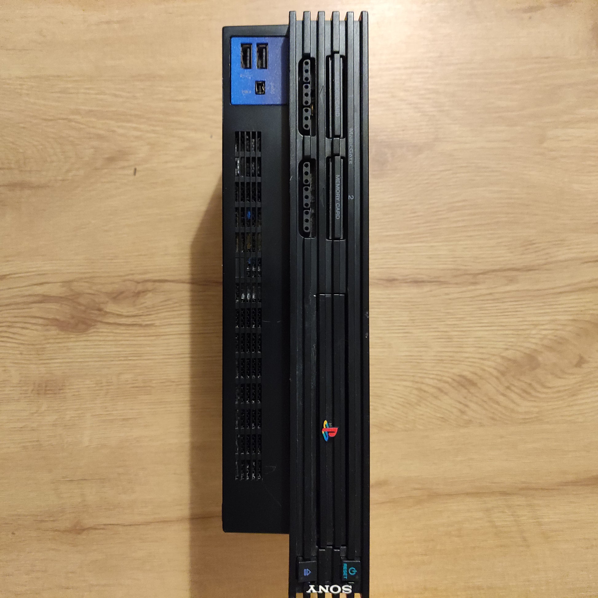 Playstation 2 (Black) with Third Party controller - 8-Bit Exchange (8BitX)