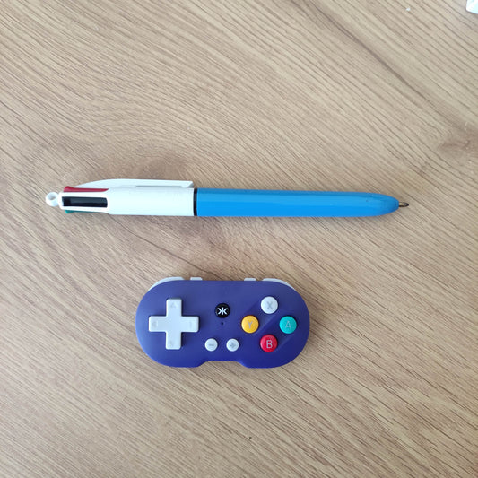 CRKD Atom keychain controller (New)Nintendo® Switch™, PC/Mac, Mobile/Tablet